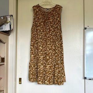 Floral sleeveless summer dress in brown. 35 inches in length